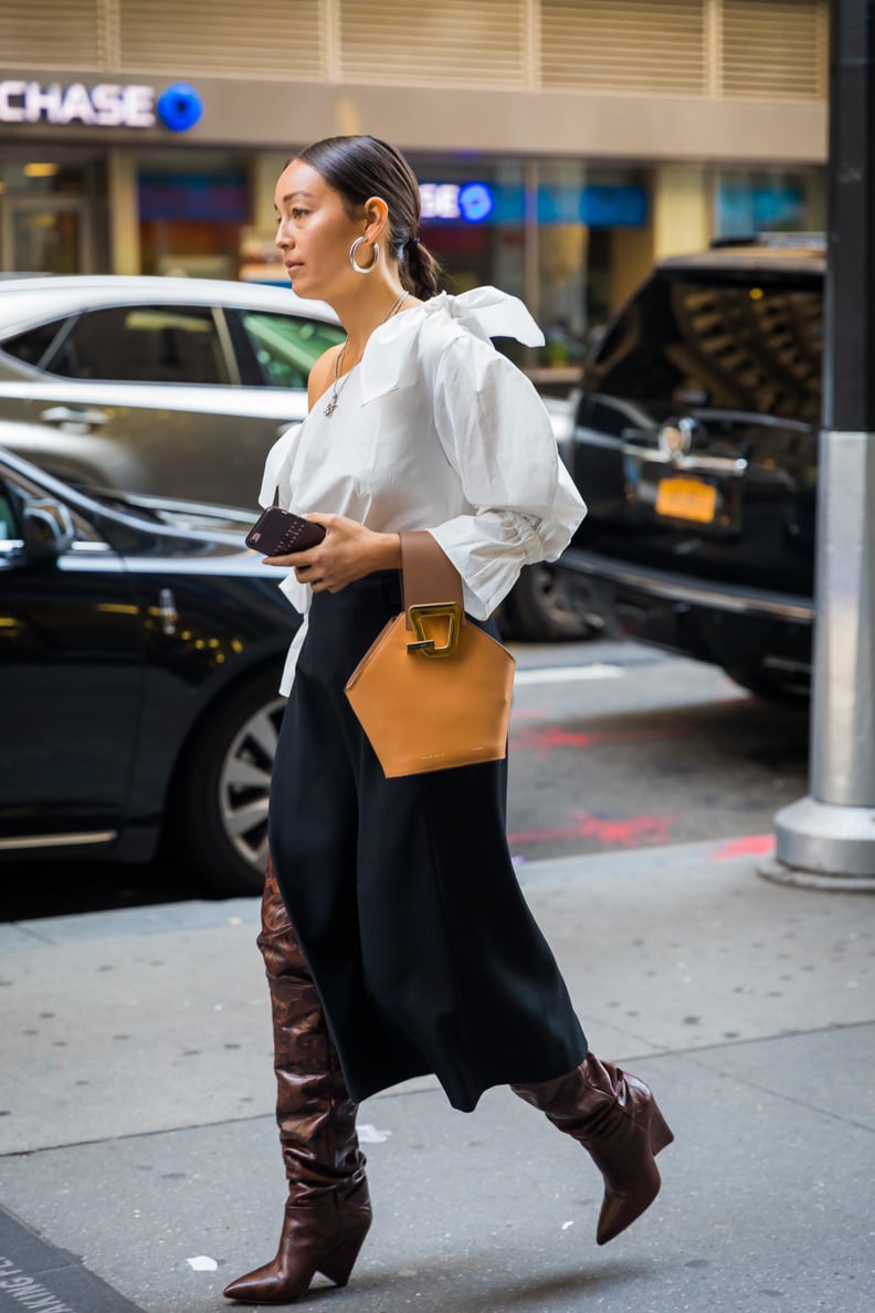 Wear Over-the-Knee Boots With a Slitted Skirt to Better Show Them Off