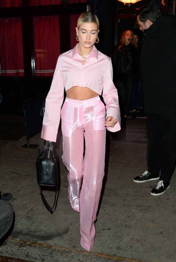 Hailey stepped out in Soho in January wearing this pink Off-White Spring 2018 coordinate set, accessorising with Jennifer Fisher hoops.