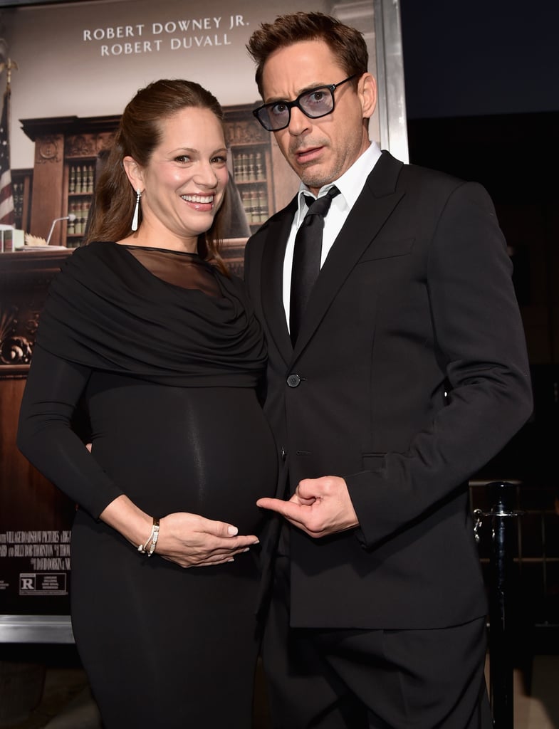Robert Downey Jr. and his pregnant wife, Susan, stayed close on the red carpet at the premiere of The Judge in LA on Wednesday.