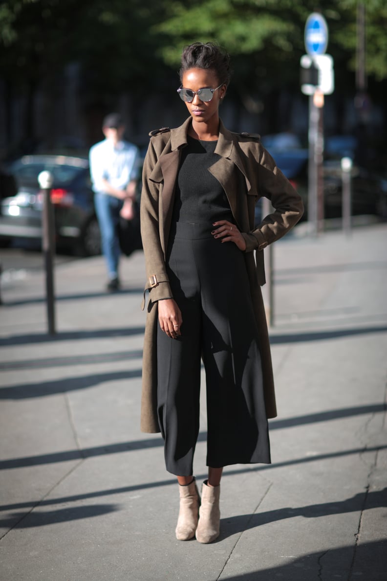 Add a neutral coat to break up a sleek all-black look.