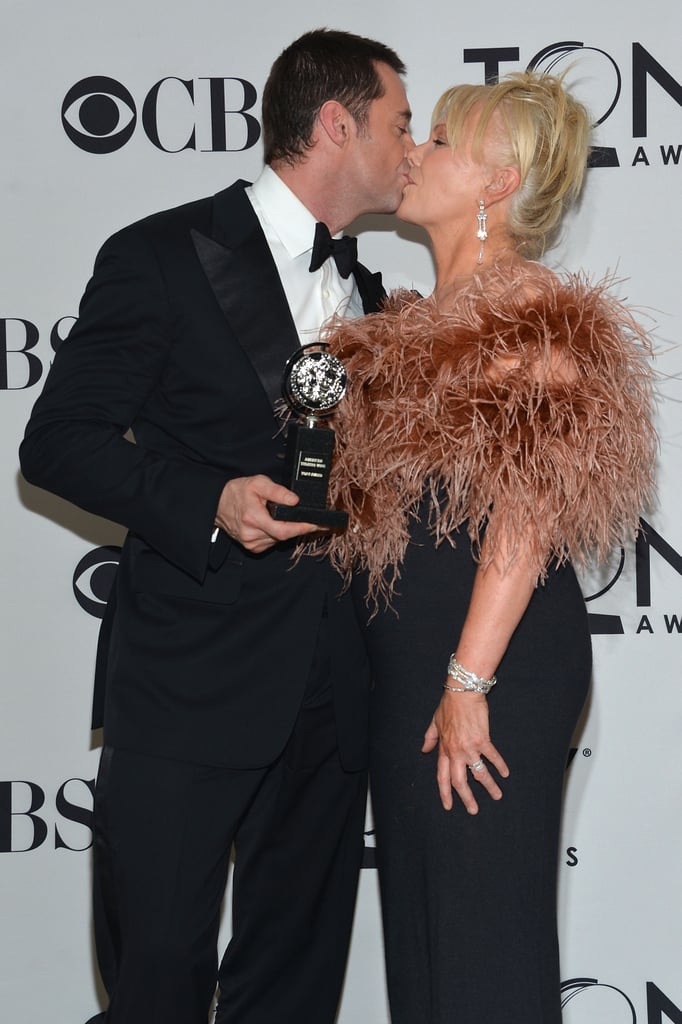 The couple snuck in a kiss at the Tony Awards in June 2012.