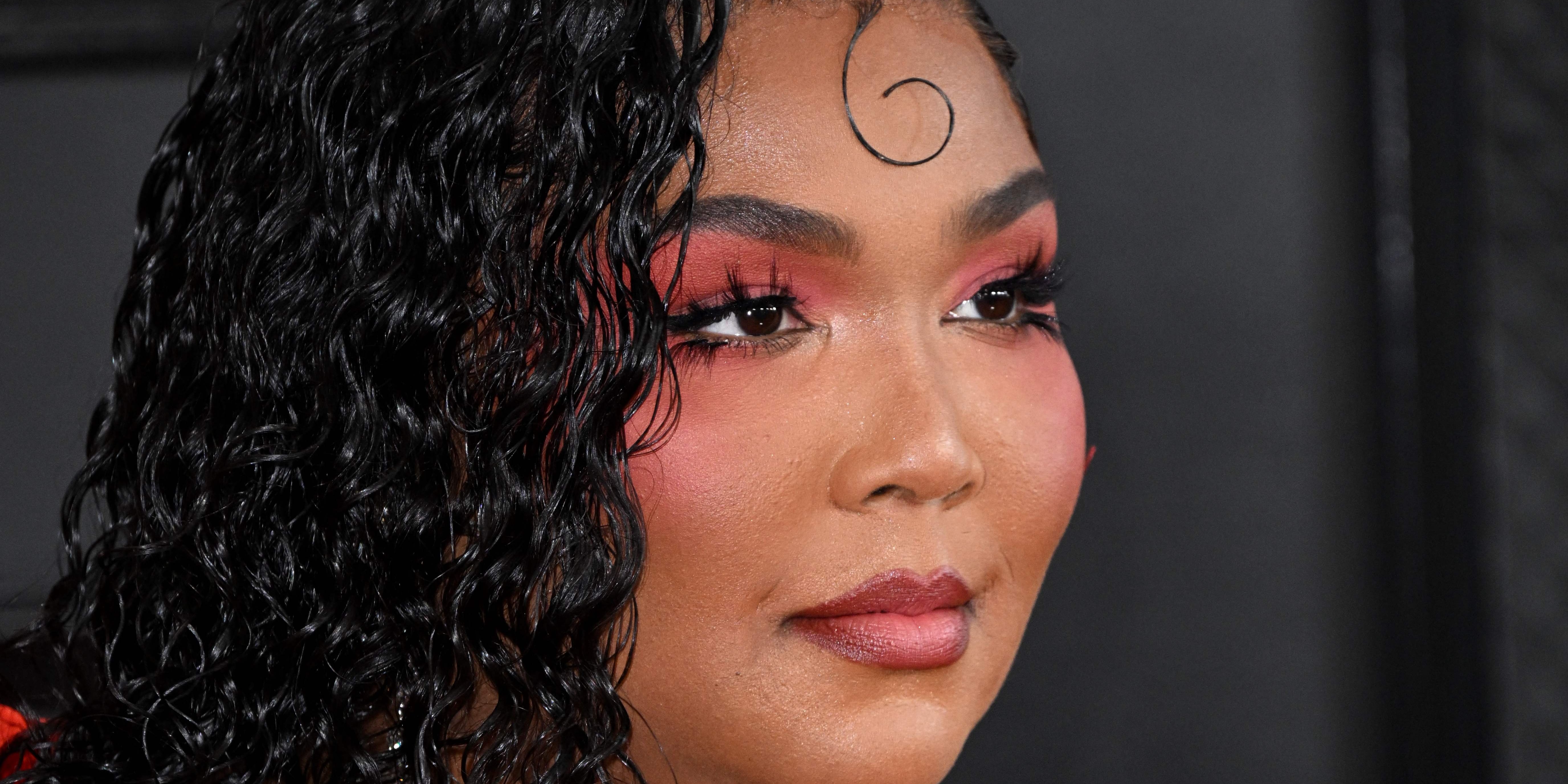 Lizzo Nailed Spring Beauty at the 2023 Grammys With Rosette Bangs and  Peachy Blush