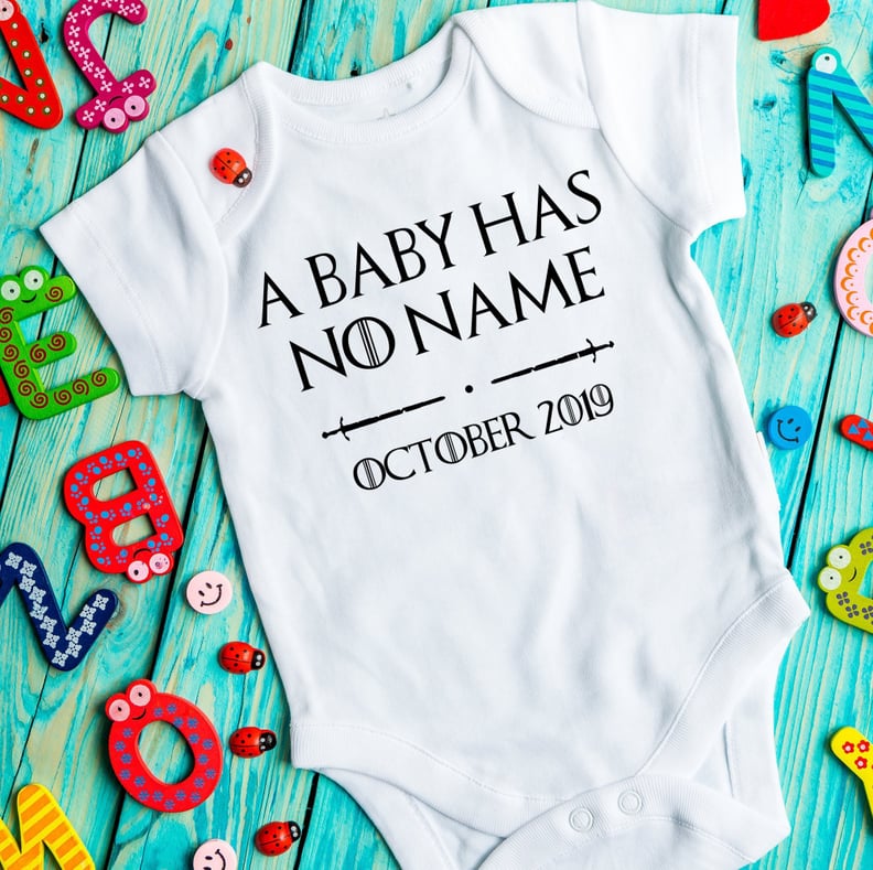 A Baby Has No Name Pregnancy Announcement Onesie