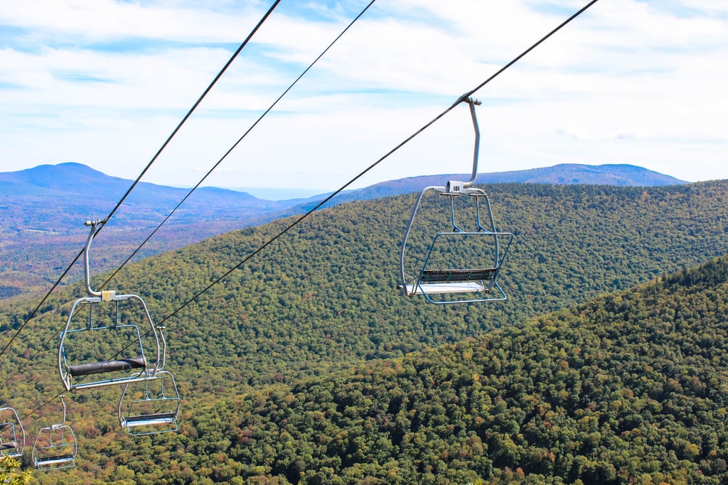 Whether you're seeking to hike, bike, fly-fish, or kayak, there's no doubt you can do it all here. However, if you're looking for something a bit more low-key — and if you're not afraid of heights — consider soaring to the top of Windham Mountain via a chairlift ride.
During this 10-minute ride, you'll not only travel two miles up to reach the 3,050-foot summit, but you'll also be able to feast your eyes on the astonishing panoramic views. Once you reach the peak, you can either sit, roll out a blanket, and take in the breathtaking scenery with a picnic or further explore nature by embarking on more hiking.