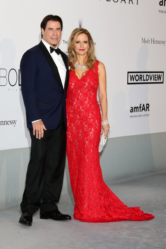 John Travolta and Kelly Preston posed for photos together at the amfAR Gala.