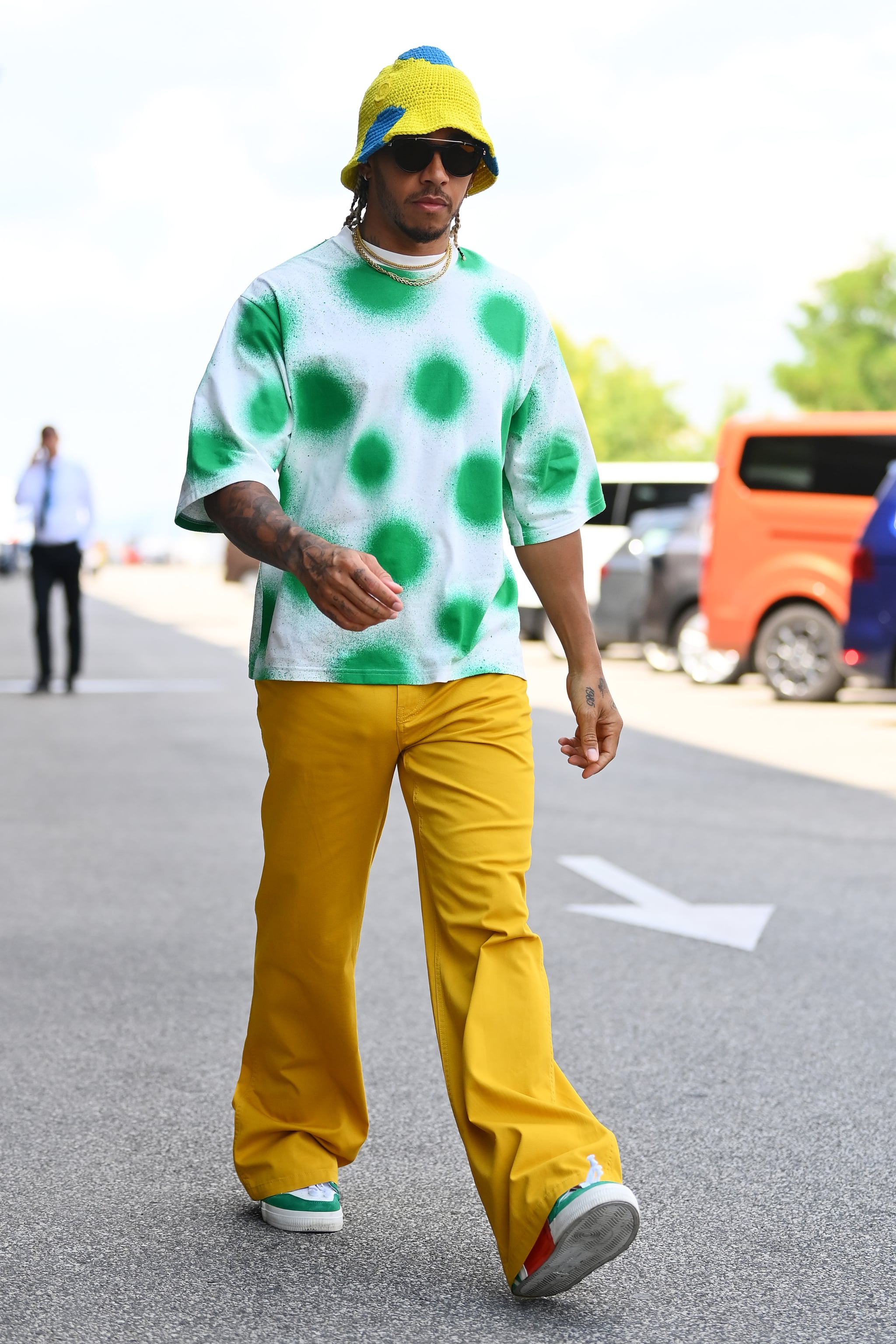 BUDAPEST, HUNGARY - JULY 28: Lewis Hamilton of Great Britain and Mercedes walks in the Paddock during previews ahead of the F1 Grand Prix of Hungary at Hungaroring on July 28, 2022 in Budapest, Hungary. (Photo by Dan Mullan/Getty Images)