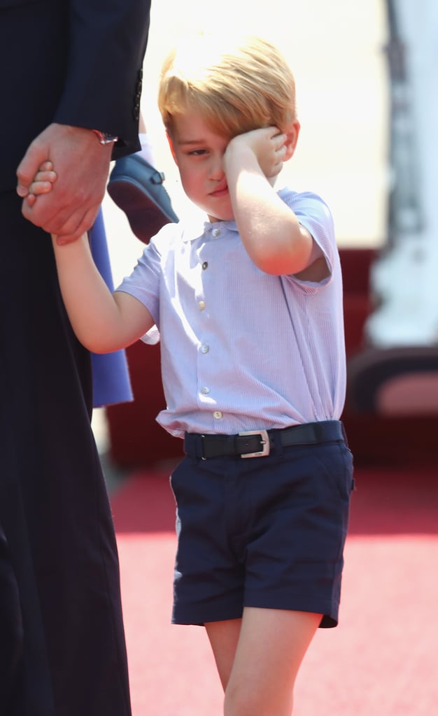 Prince George flashed his signature unimpressed face when he landed in Berlin to tour the city with his family.