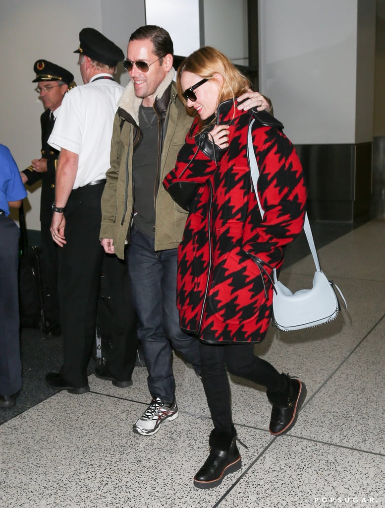 Kate Bosworth and Michael Polish made their way through LAX with a smile on Thursday.