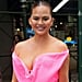 Chrissy Teigen Goes Full Barbie in a Plunging Pink Minidress and Platform Stilettos