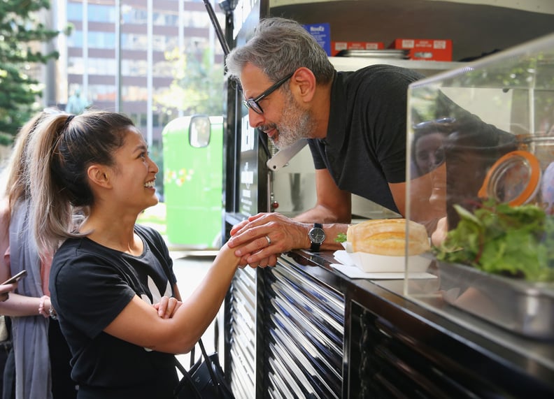 Heck, I'd eat anything if he grasped my hand like that. But it helps that the sausages and toppings look really good.