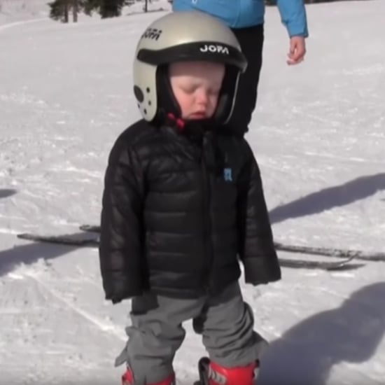 Little Boy Snowboarder Falls Asleep Standing Up