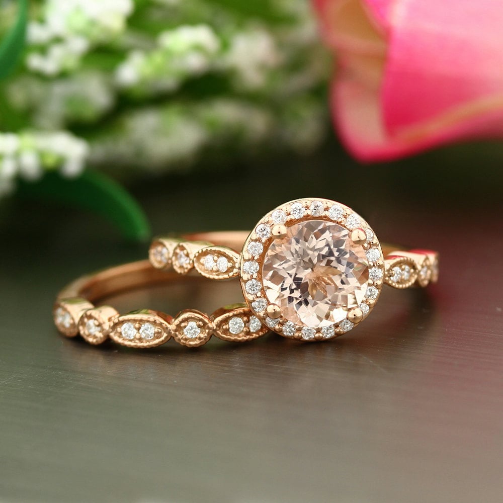 A ring doesn't get any more art deco than this 8 mm round-cut style ($1,538) surrounded by conflict-free diamonds.