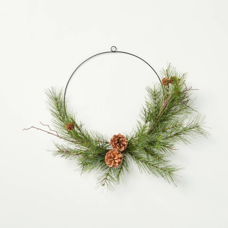A Modern Wreath: Hearth & Hand with Magnolia 18" Pine Sprigs Seasonal Faux Asymmetrical Wire Wreath