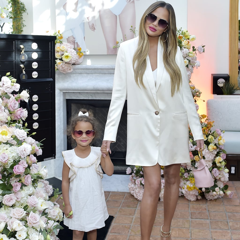 Chrissy Teigen John Legend And Luna At Quay Event Photos Popsugar Celebrity
