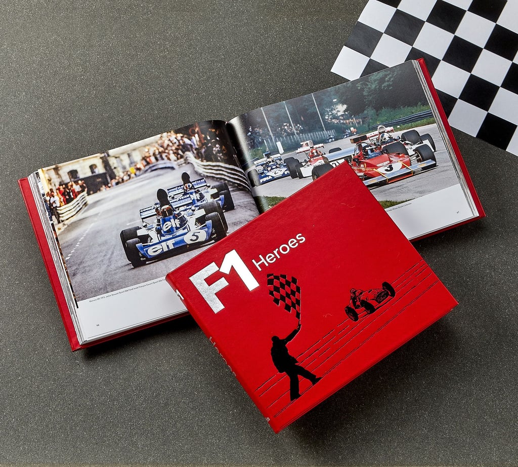 "F1 Heroes" Leather-Bound Book ($169)
Elevate their home with a stylish and bold decor piece like this "F1 Heroes" coffee table book. It lets them display their favorite sport without looking too cheesy. Plus, the book has 70 years of racing history, including pictures from races, engineering feats, and so much more.