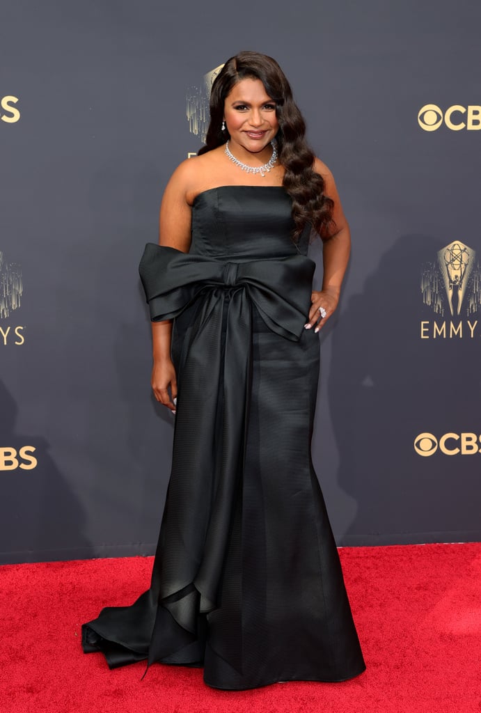 Kaling kept it classic in this strapless Carolina Herrera satin dress with a big bow at the waist. She completed the look with elegant diamonds at the 2021 Emmy Awards.