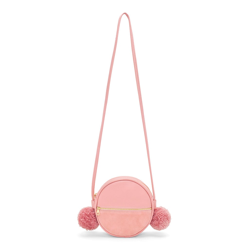 It's the little things—keep em' close with our exciting new circle bag, the Tambourine  Crossbody.