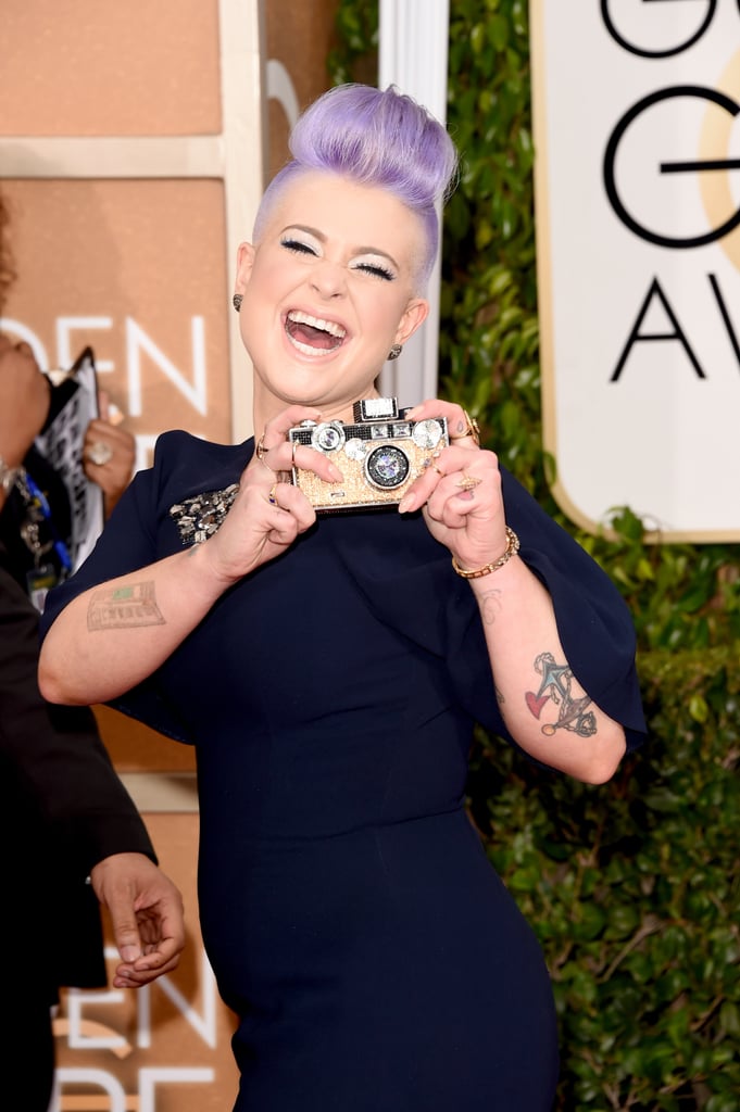 Kelly Osbourne turned the tables on the photographers.