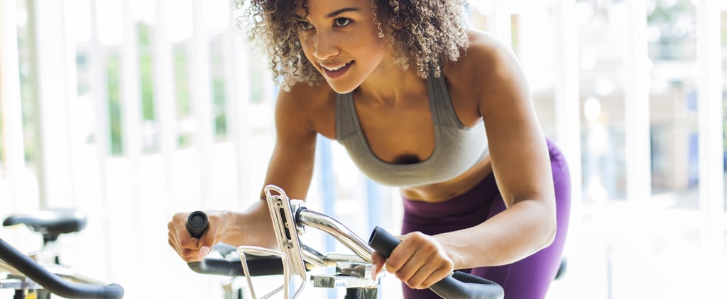 Stationary Bike Exercises That'll Elevate Your Workout