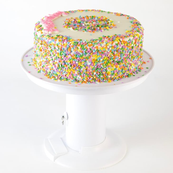 Popping Cake Stand This Popping Cake Stand Lets You Hide a Gift