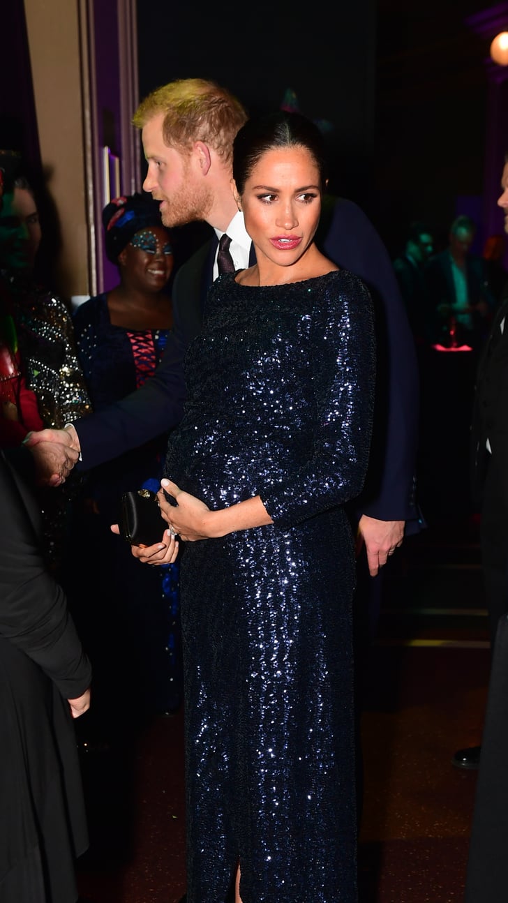 Meghan paired the look with a gold bracelet that belonged to Princess Diana and a black Givenchy satin clutch.