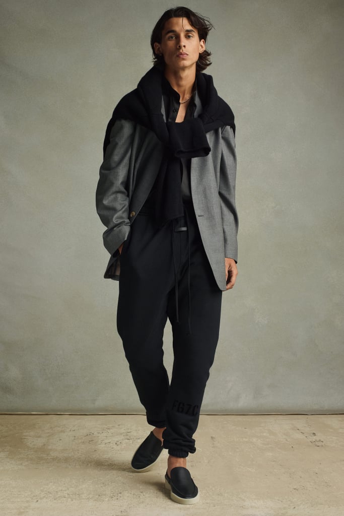 Something about this outfit makes me think of grabbing a coffee somewhere in Europe. Which I guess makes sense, being it was sourced and produced in Italy. The cashmere knit tied around the neck and oversize long blazer with easy trousers is for the chic European girl in all of us.