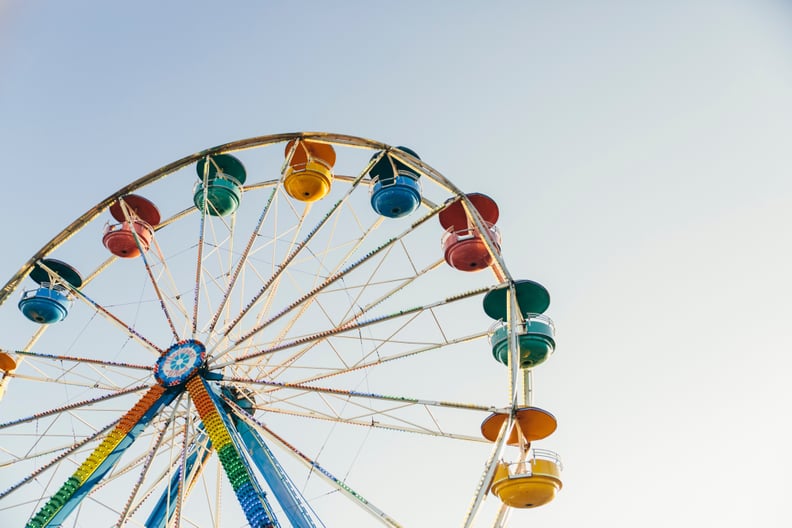 Win each other prizes at a carnival.