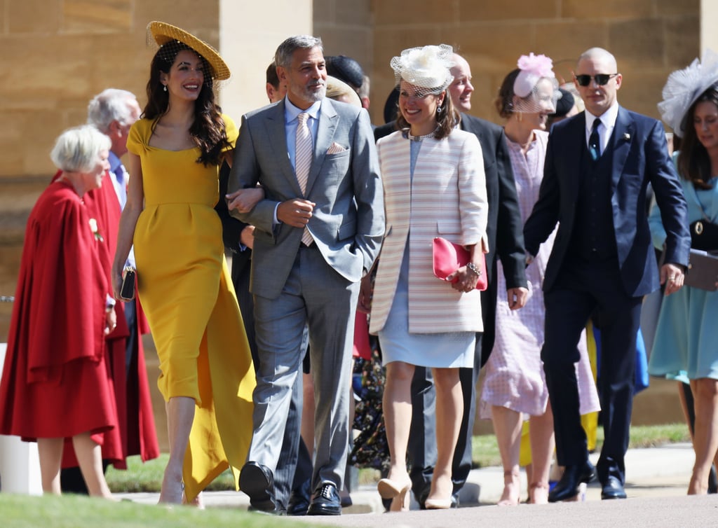 With Amal and George Clooney at Prince Harry and Meghan Markle's wedding in 2018.