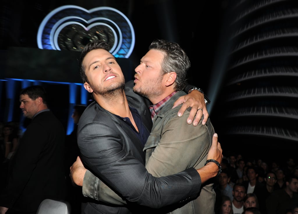Luke Bryan narrowly avoided a kiss from Blake Shelton backstage at the iHeartRadio Music Awards.