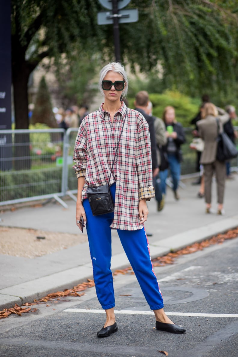 Style Your Sweatpants With a Loose Flannel and Leather Accessories
