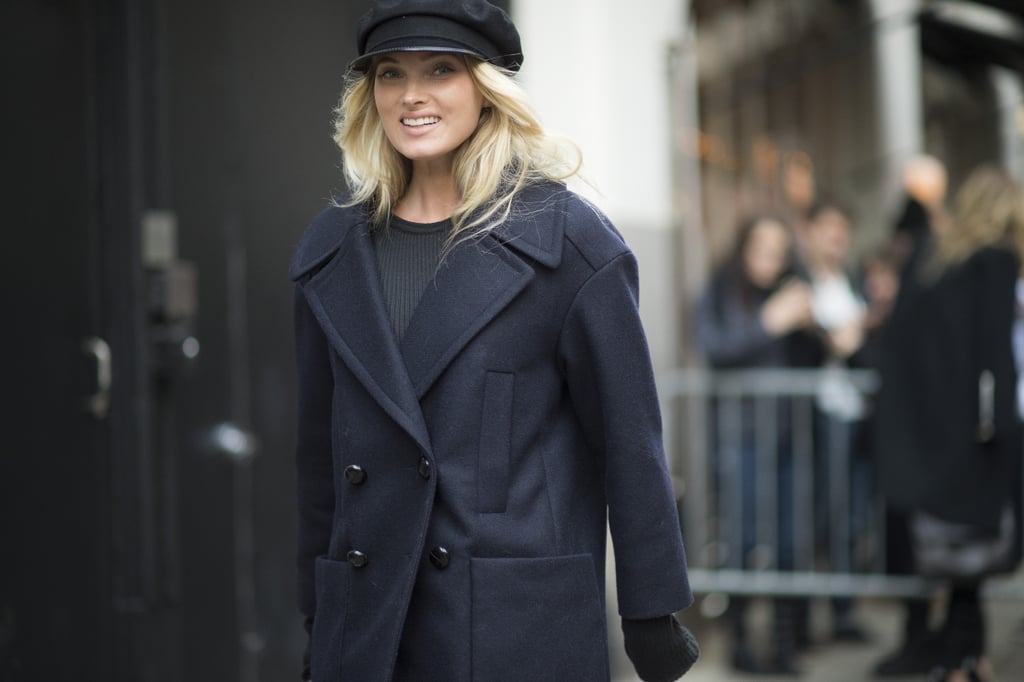 Elsa Hosk topped off her structured peacoat with a flirty newsboy cap.