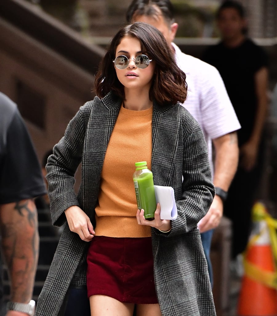 Selena Gomez's Orange Sweater and Red Skirt