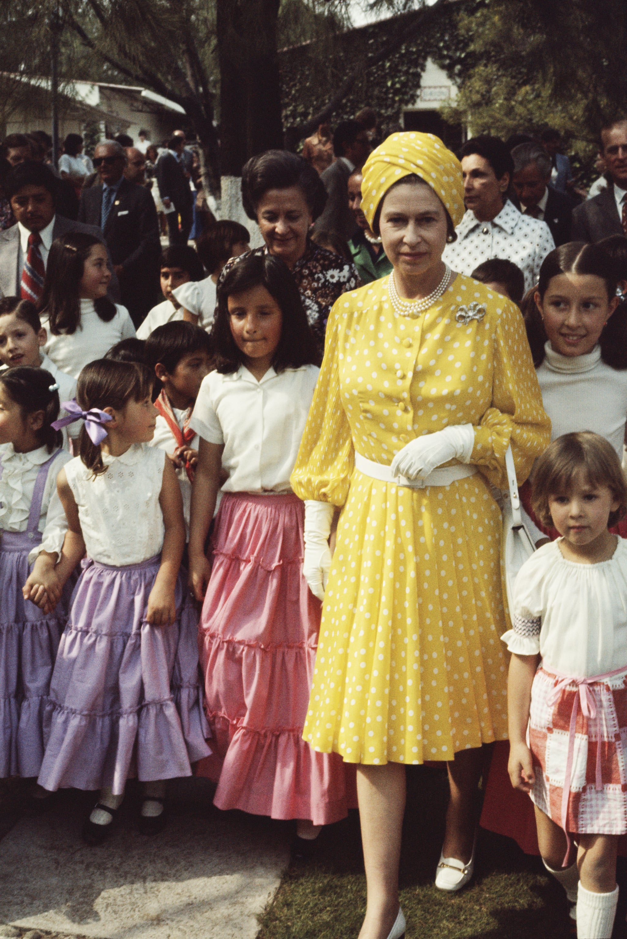 Queen-channels-Elizabeth-Taylor-yellow-turban-trip.jpg