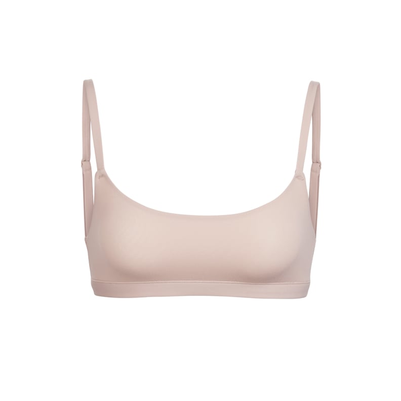 SKIMS - Kim Kardashian West wears the Scoop Neck Bra ($32) and the