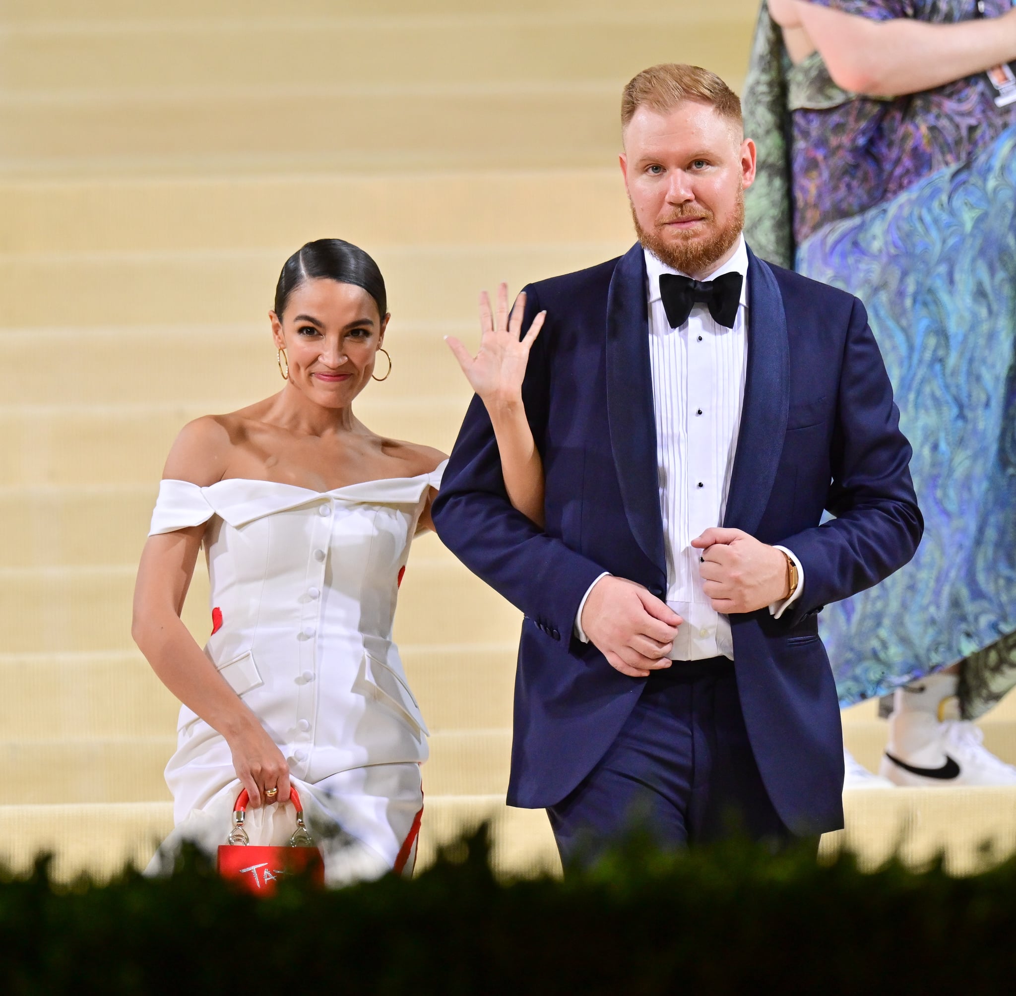 NEW YORK, NEW YORK - SEPTEMBER 13: Alexandria Ocasio-Cortez and Riley Roberts leave the 2021 Met Gala Celebrating In America: A Lexicon Of Fashion at Metropolitan Museum of Art on September 13, 2021 in New York City. (Photo by James Devaney/GC Images)