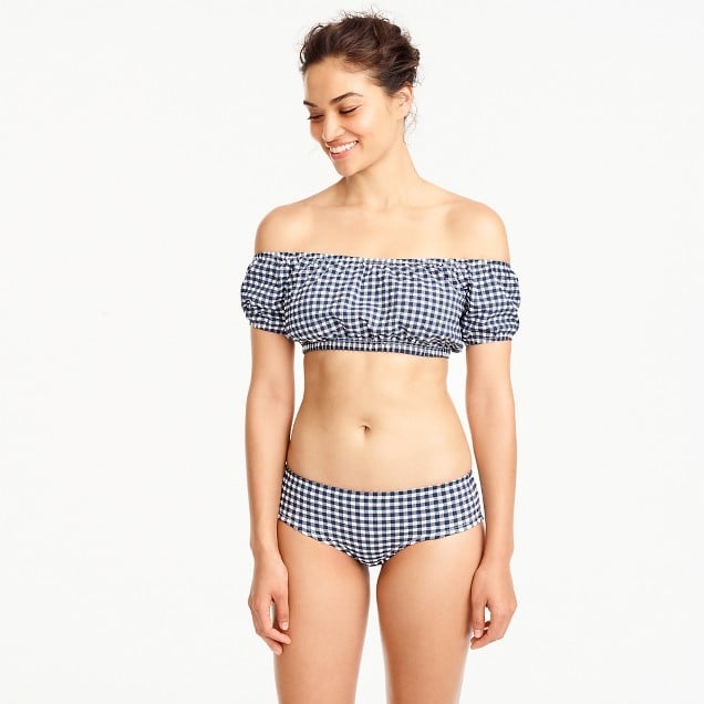 For a crop-top look, the J.Crew Gingham Off-the-Shoulder Swim Top ($58) and J.Crew Gingham Bikini Boy Short ($50) have you covered.