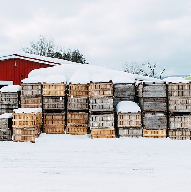 (Answer: He's between some crates on the far left!)