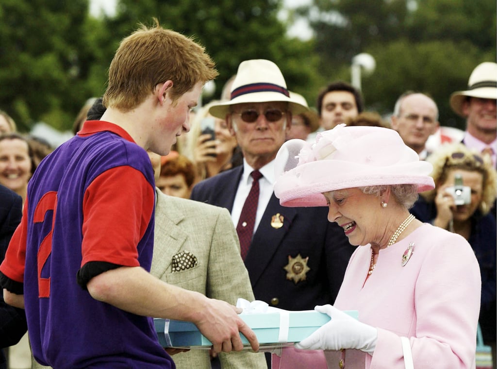 The queen presented her grandson Prince Harry with an award during the Royal Ascot in 2003.