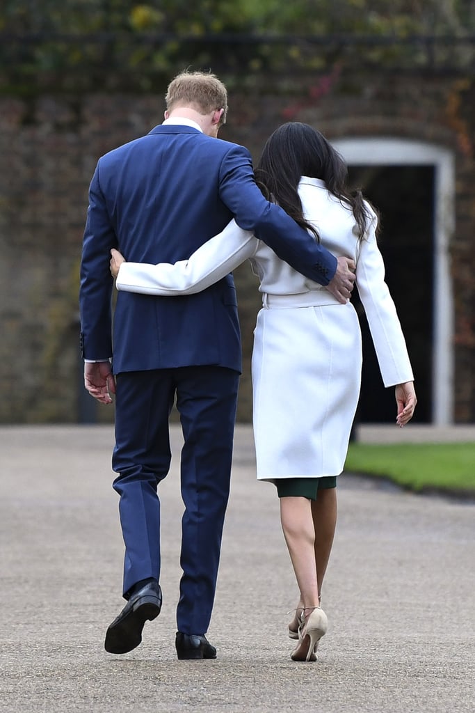 Meghan Markle and Prince Harry Hands on Each Other's Backs