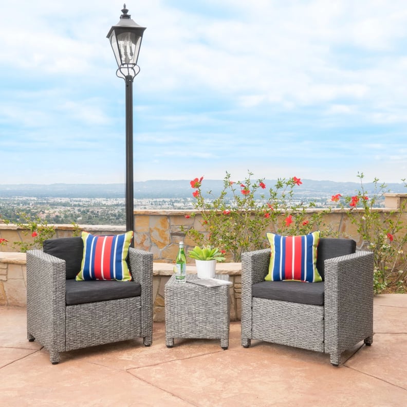 A Faux Rattan Patio Set: Puerta Wicker Club Chair Set