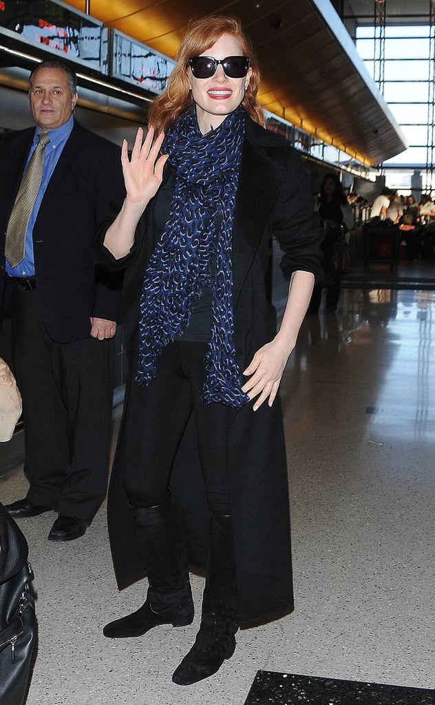 Jessica Chastain waved to cameras as she made her way through LAX on Monday.