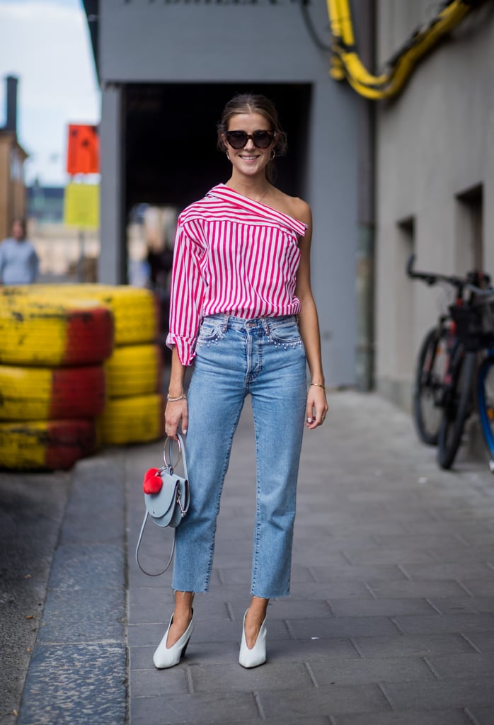 Look good enough to eat with a candy striped asymmetric top and white heels.