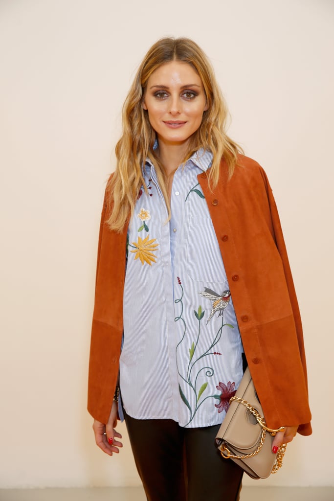 Olivia wore this Tibi suede shirt over her Zara embroidered top, proving the burnt-brown hue does go with everything.