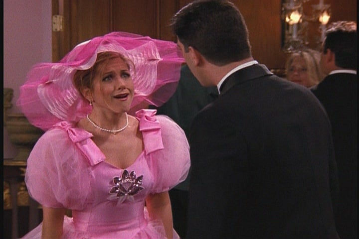 9. Don't make your bridesmaids wear ugly dresses.
We have to believe that Rachel's Little Bo Peep dress for Barry and Mindy's wedding was the groom's way of paying Rachel back for running out on their wedding.