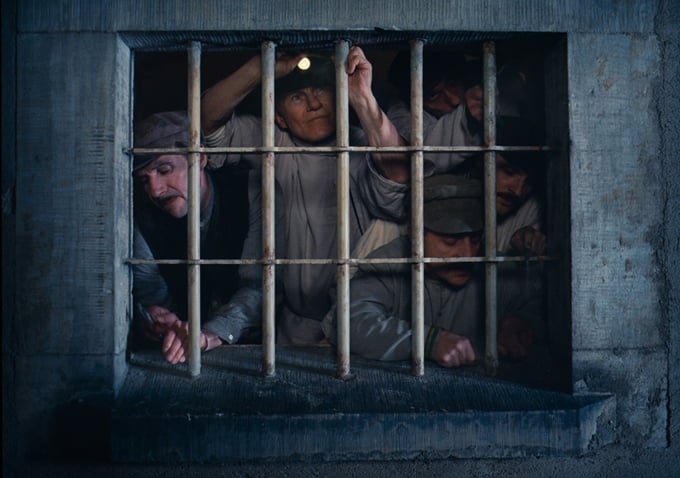 Ludwig (Harvey Keitel) and co. inspect the bars on their window.