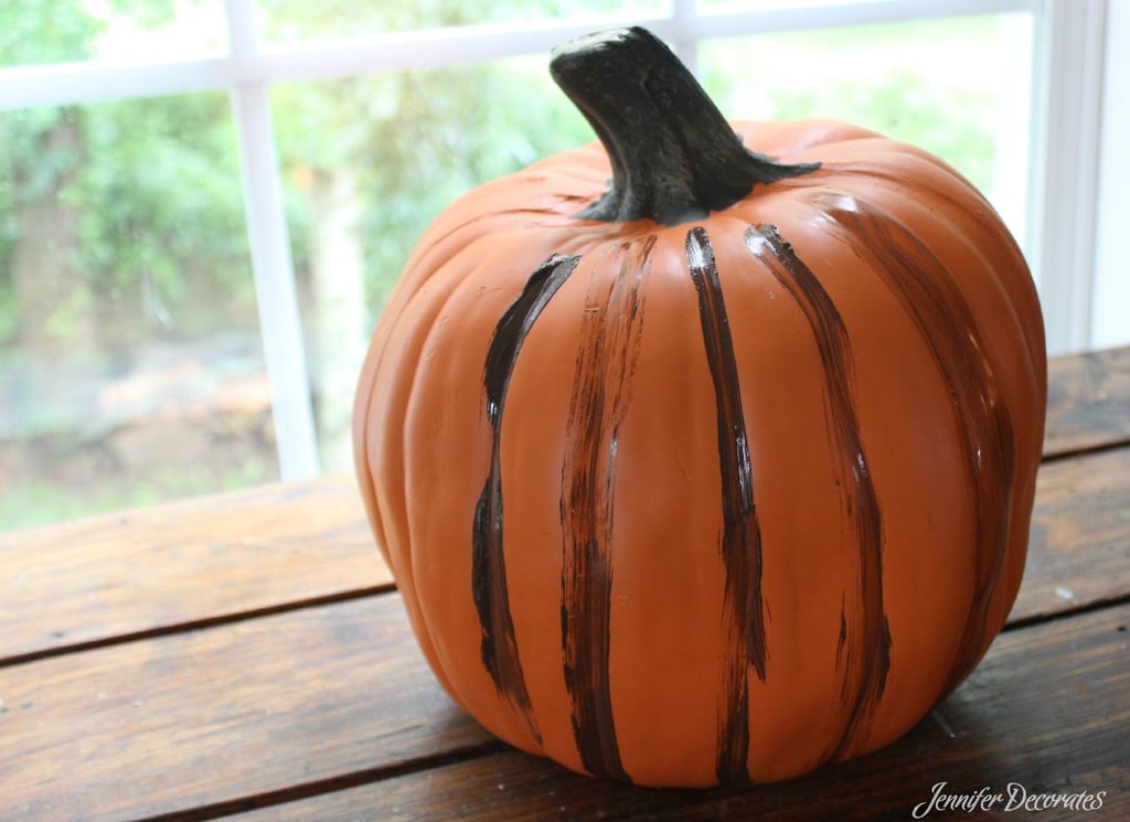 After watering down the paint, brush it onto the pumpkin.