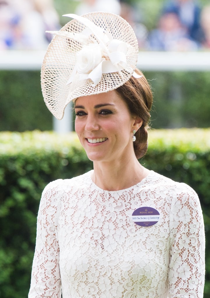The year before, Kate wore an eerily similar white lace look, and once again had her badge pinned to her chest.