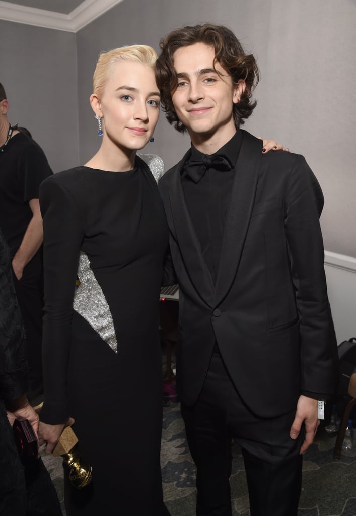 The duo looked sharp as ever at the Golden Globe Awards on Jan. 7, rocking similar edgy black ensembles. We see you holding that award, girl!