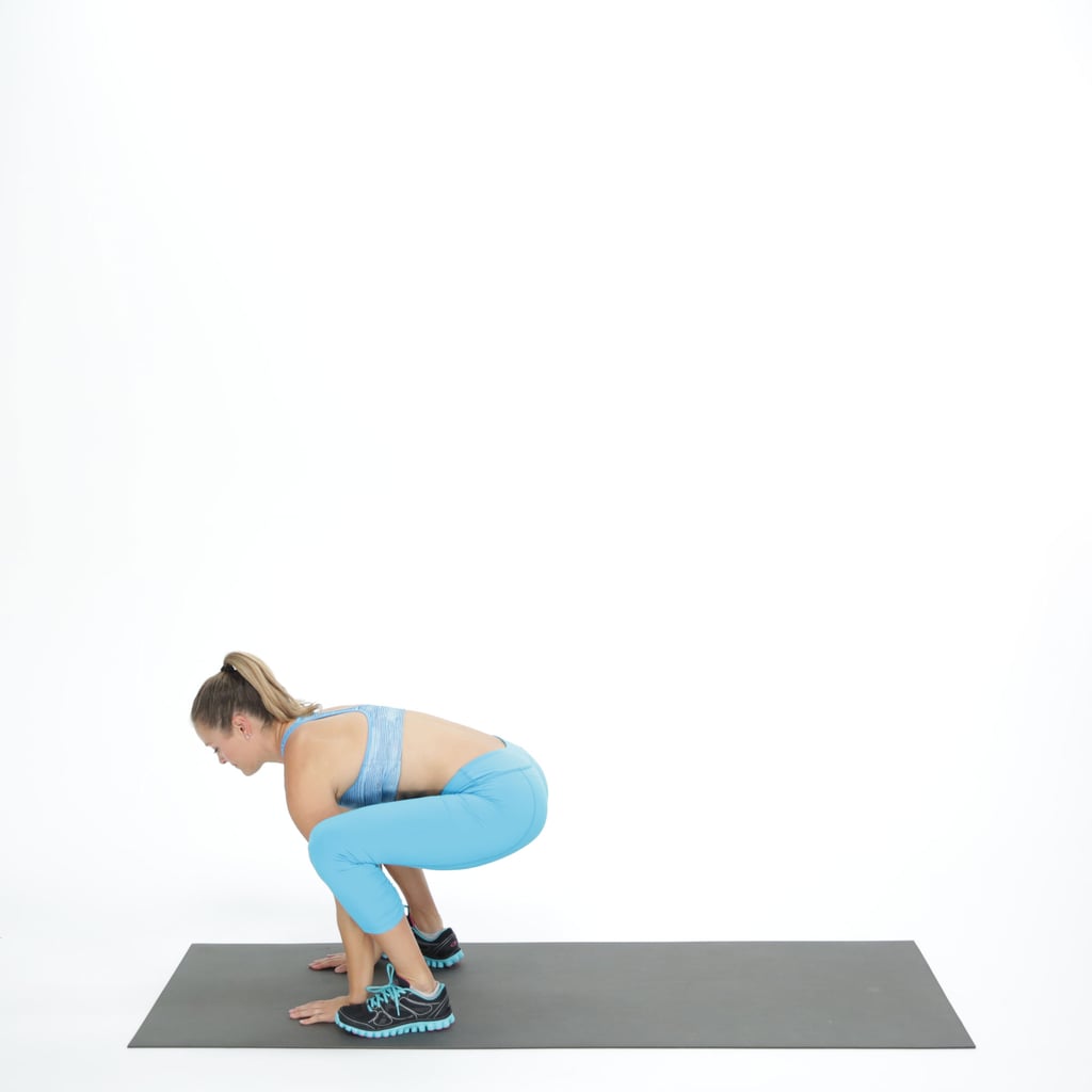 Step the left foot forward, coming into a low squat. 