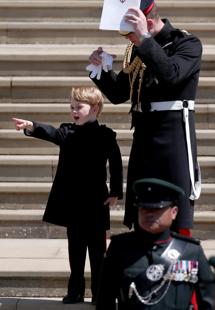 Prince William with George at Prince Harry's wedding.